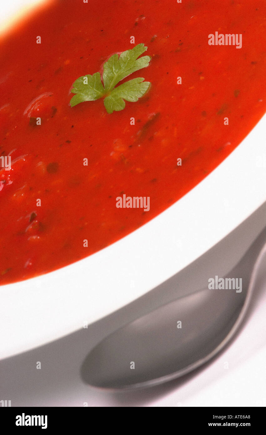 tomato soup in white bowl Stock Photo