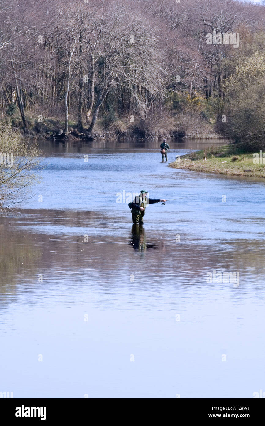 Anglers fly fishing for trout and salmon in a river in Co Kerry Ireland Stock Photo Alamy
