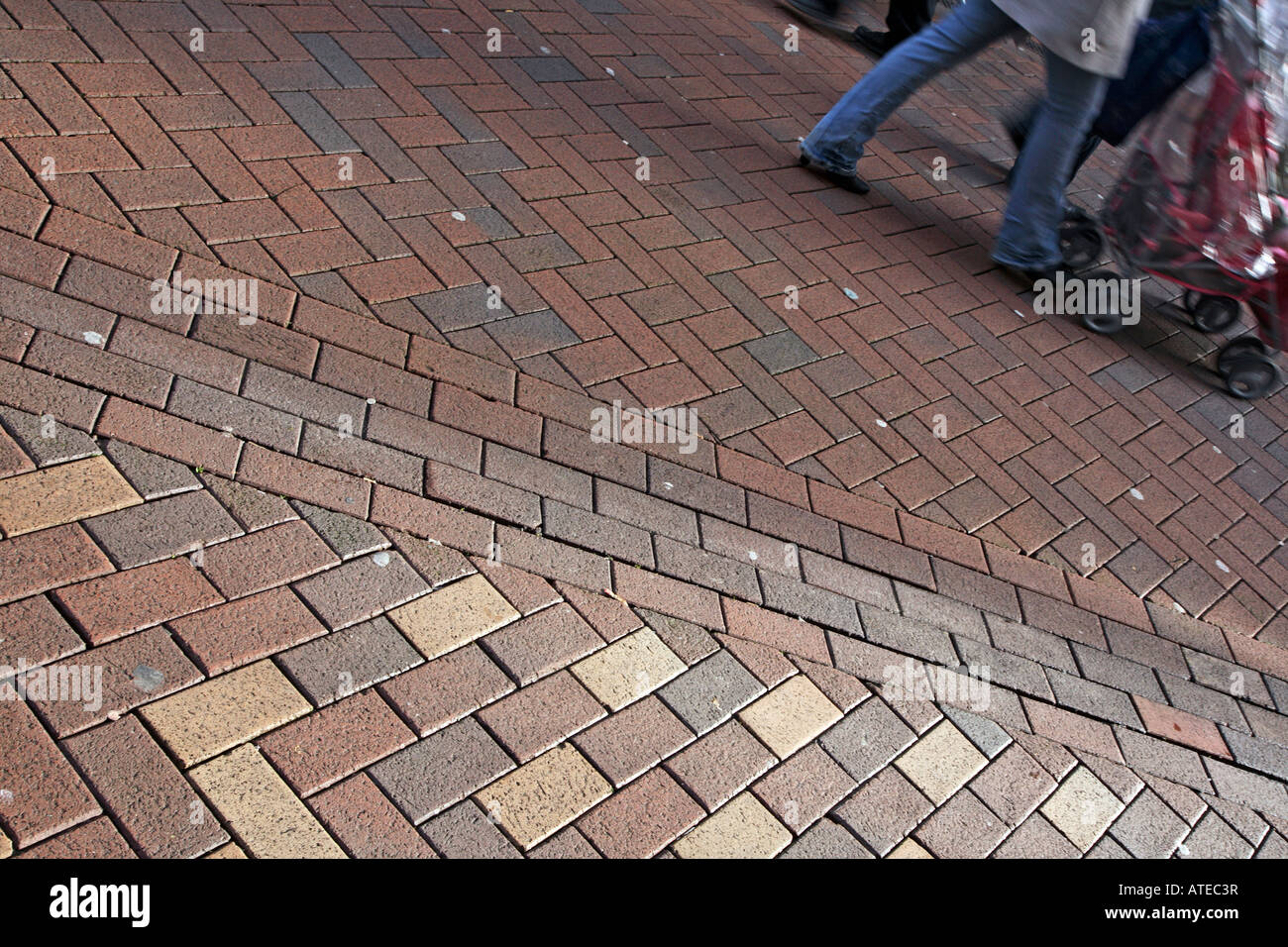 Pedestrians Walking on Pavement Weymouth UK Stock Photo