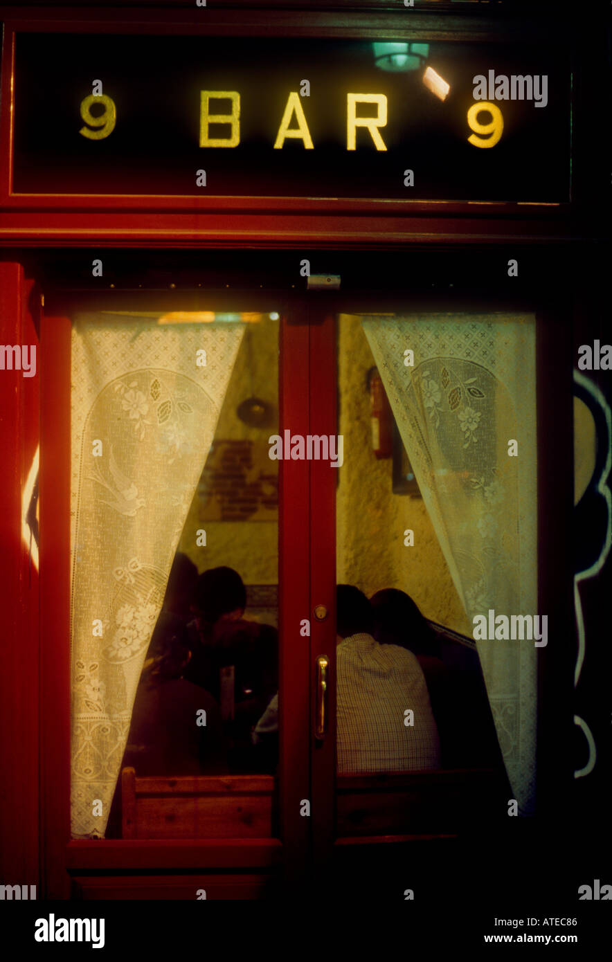 Window of bar by night Madrid Spain Stock Photo - Alamy