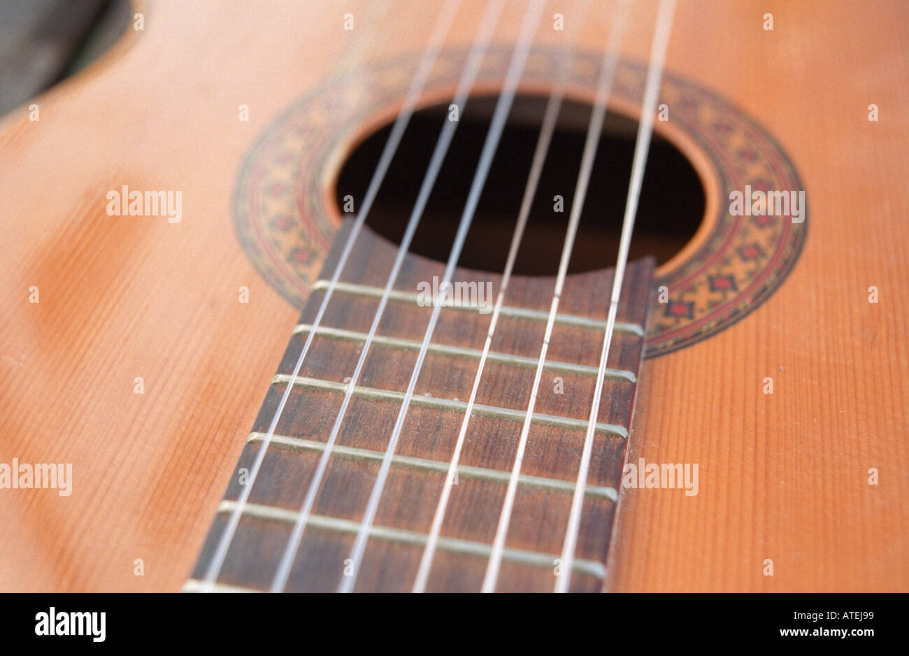 sound hole of acoustic classical nylon strung guitar Stock Photo