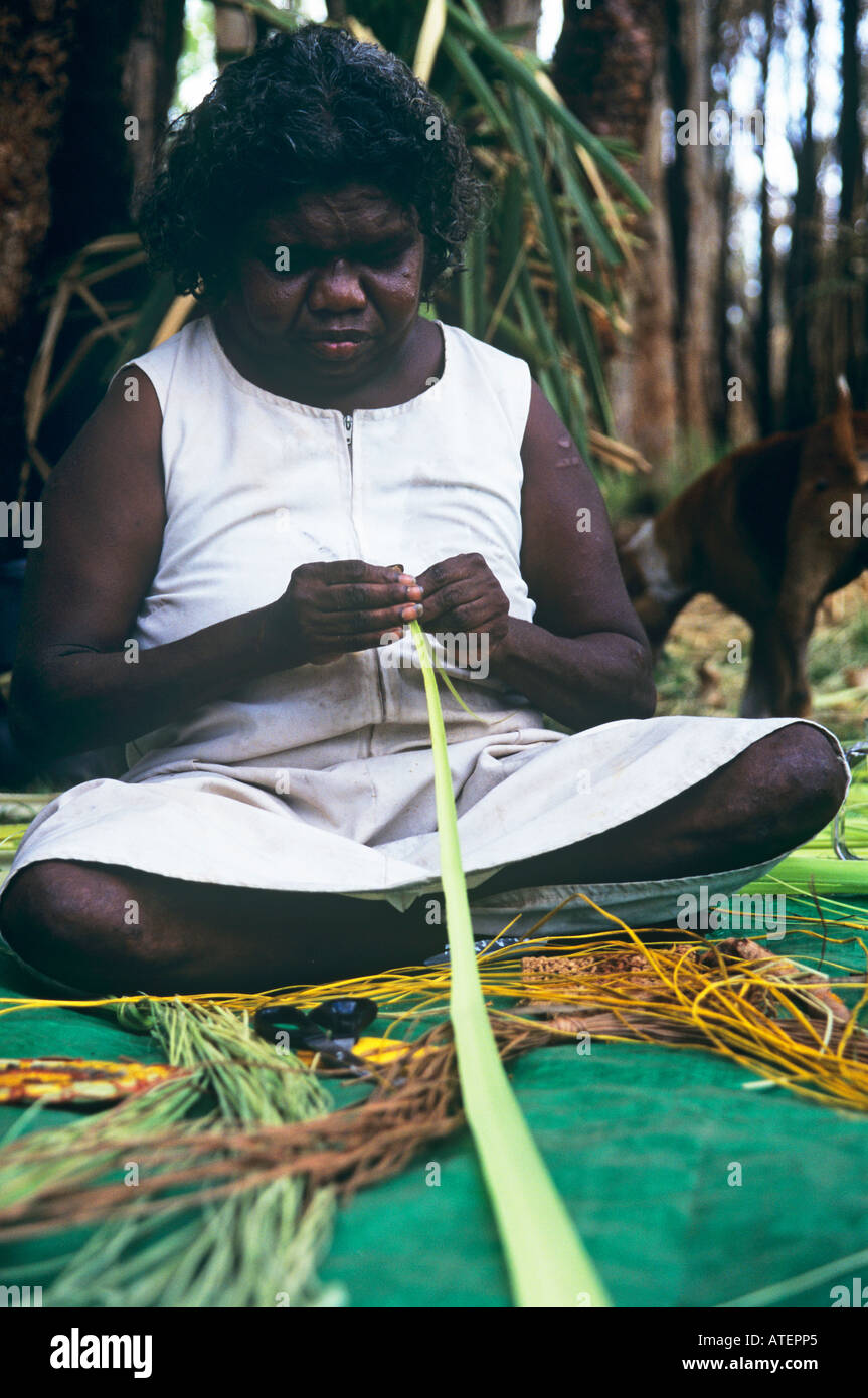 Demonstarting pandanus leaf weaving at the Manyallaluk settlement on the Aboriginal tour of the
