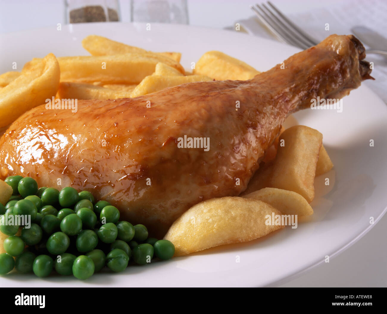 Chicken And Chips With Peas Stock Photo Alamy
