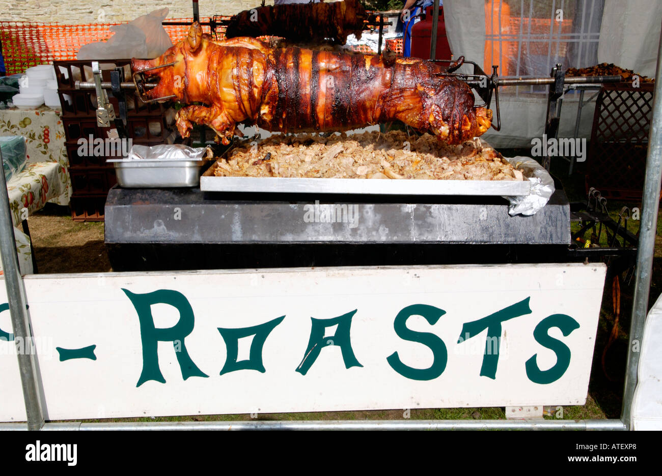 Whole spit roast pig at the annual Ludlow Food Festival Shropshire England UK Stock Photo