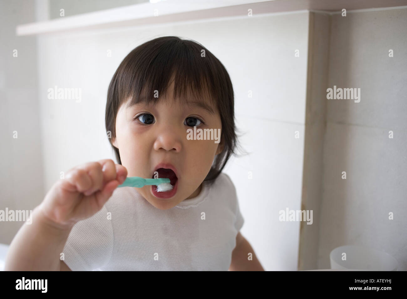 Child brushing teeth. Stock Photo