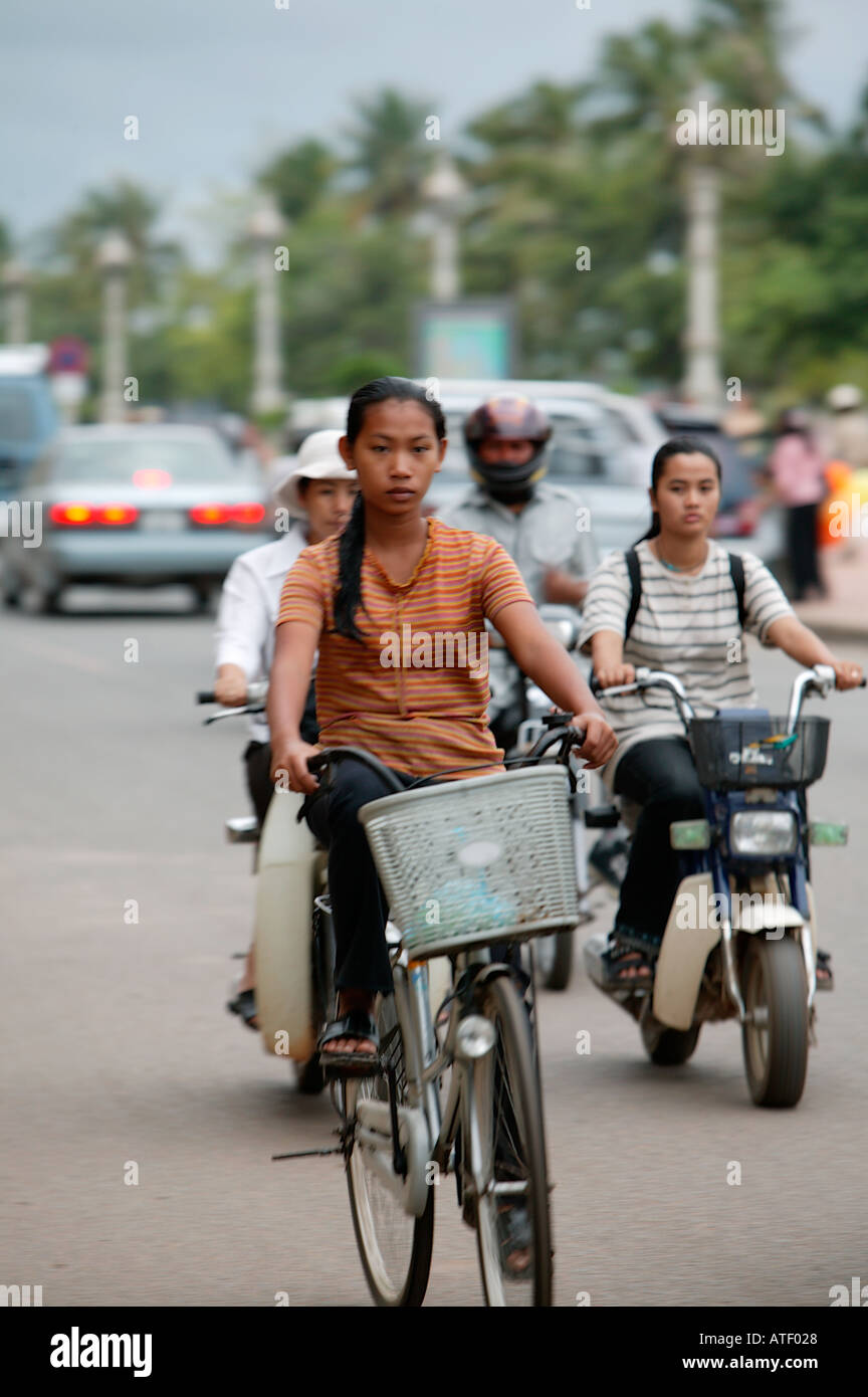 Girl on bike Phnom Penh Cambodia Asia Stock Photo