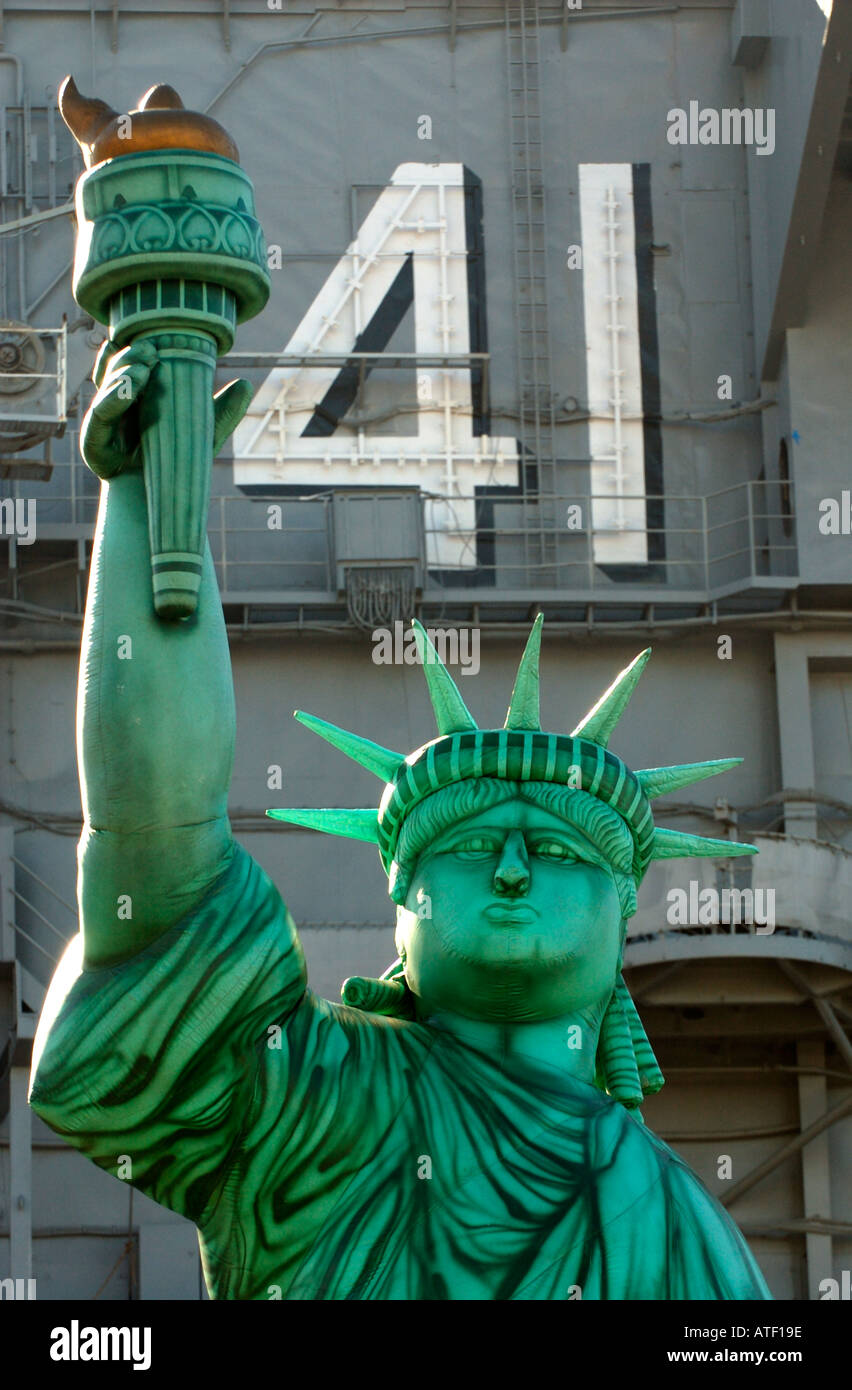 At an event celebrating the arrival of the aircraft carrier USS Midway in San Diego an inflatable representation of the Statue  Stock Photo