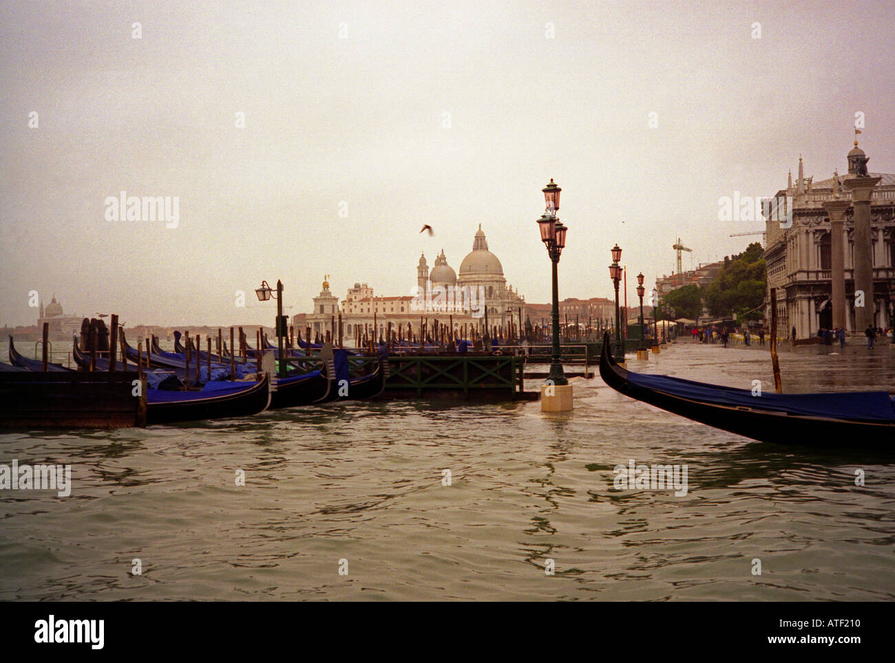 Waterscape high tides gondolas’ docking San Marco Saint Mark square Venice Veneto Northeast Northern Italy Europe Stock Photo