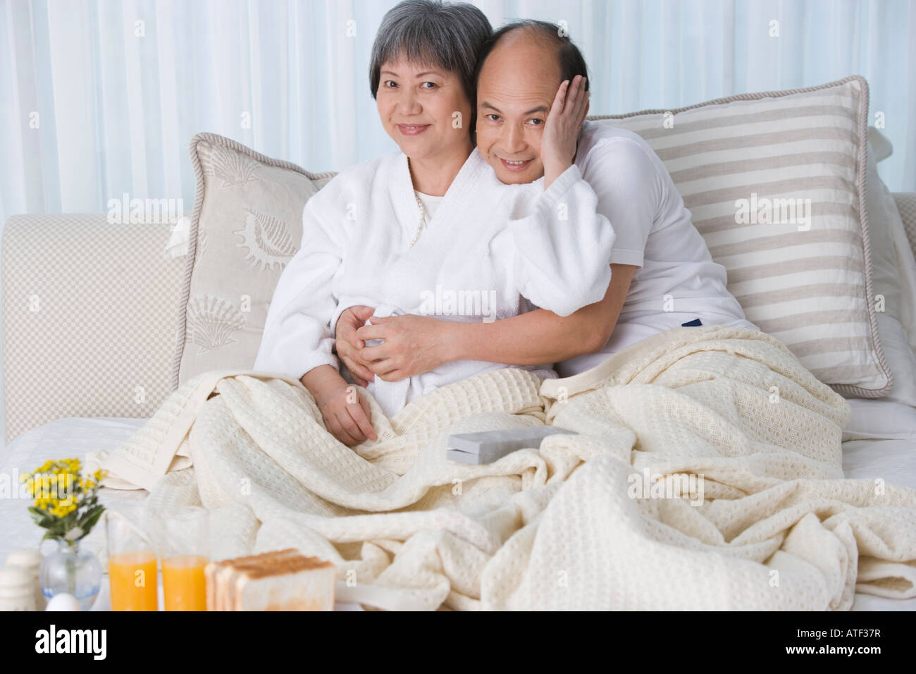 Loving mature couple bed hi-res stock photography and images - Alamy