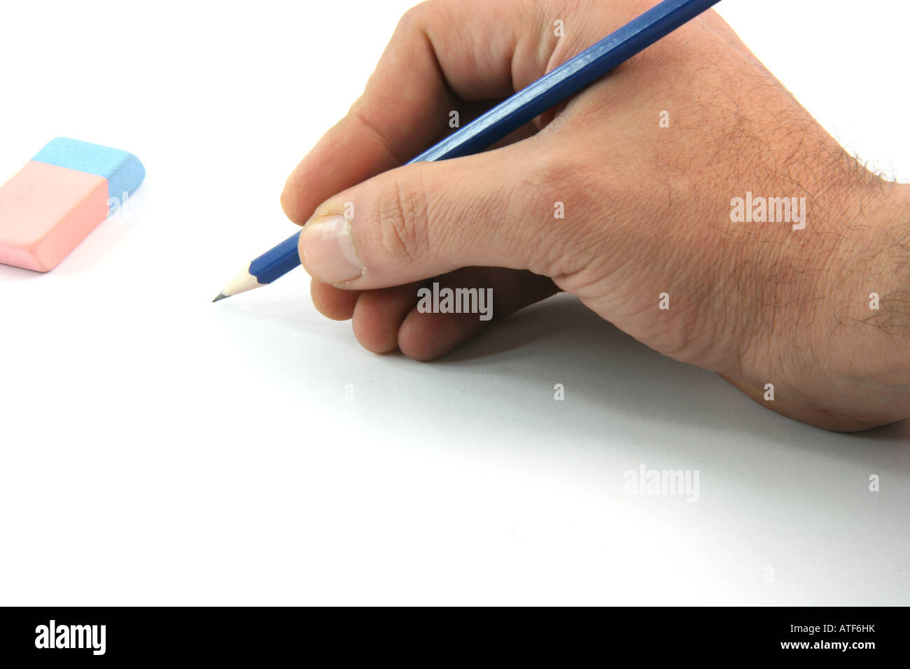 writting with black pencil closeup and eraser isolated on white ...