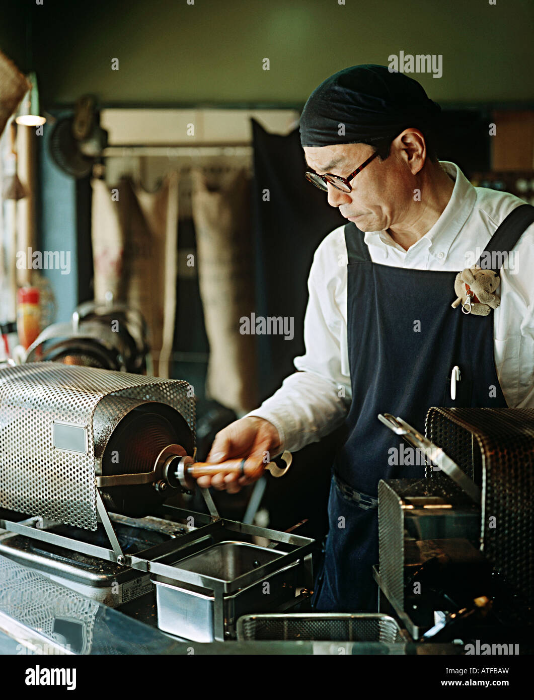 Man roasting coffee beans Stock Photo Alamy