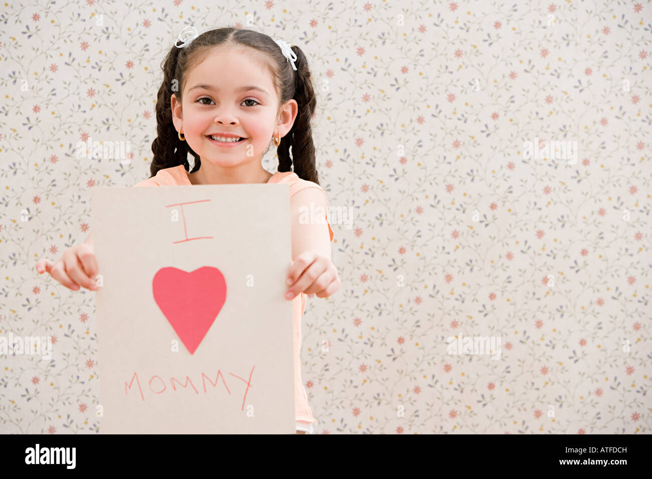 Girl holding a card Stock Photo - Alamy