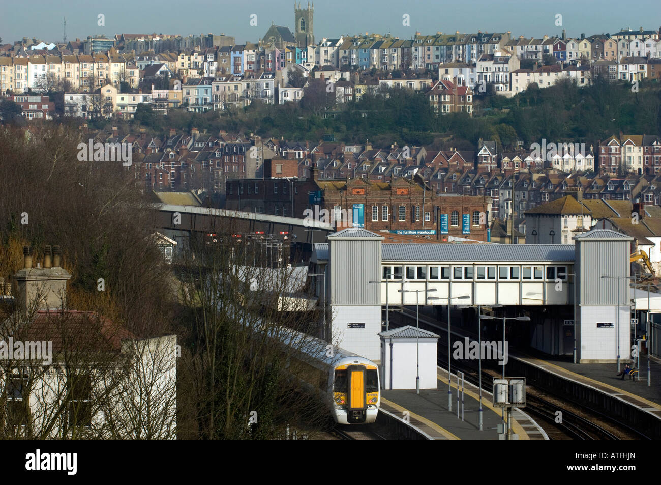 Hastings town railway station in Sussex with a view over Hastings and St Leonards in the background Stock Photo