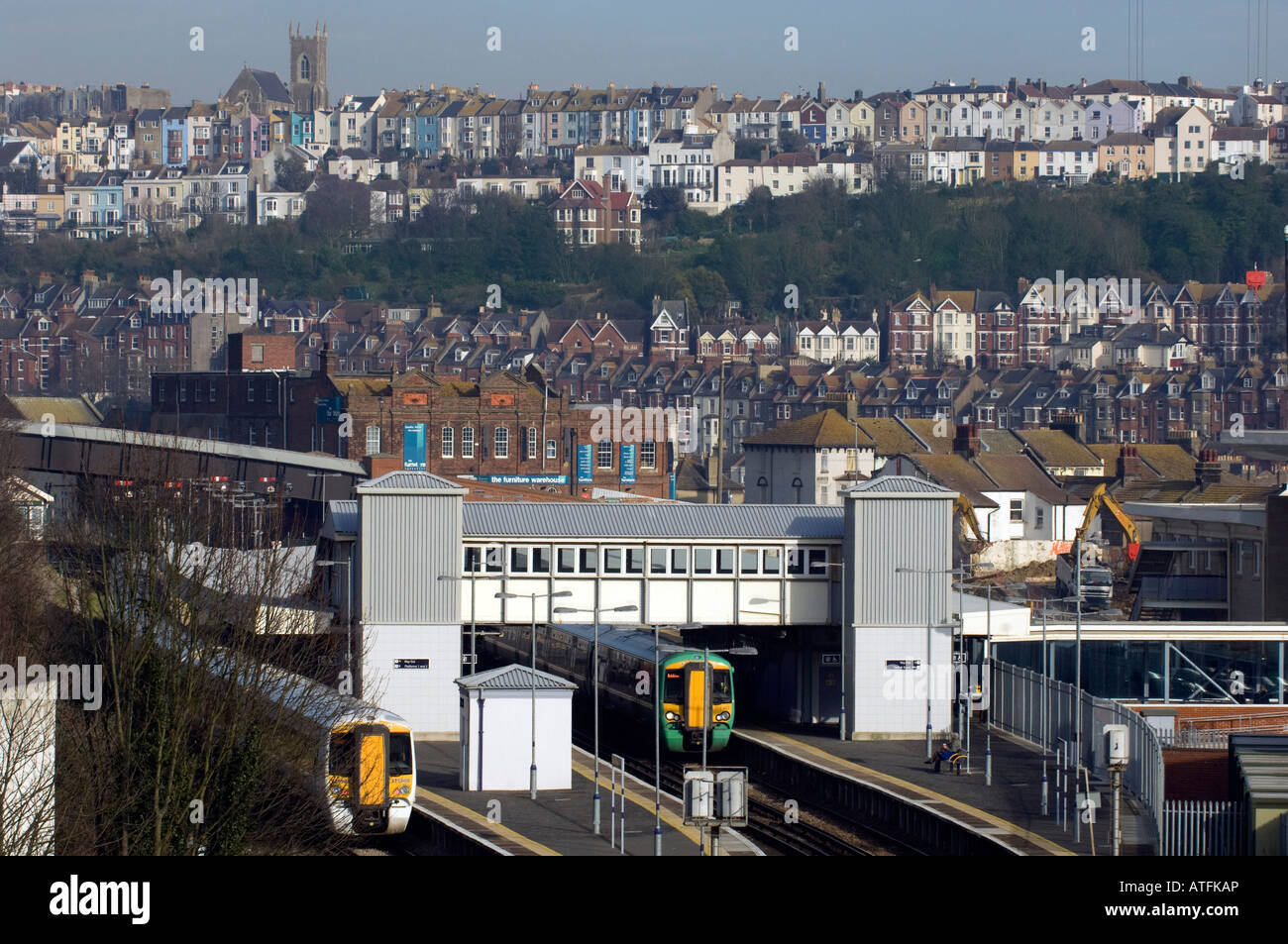 Hastings town railway station in Sussex with a view over Hastings and St Leonards in the background Stock Photo