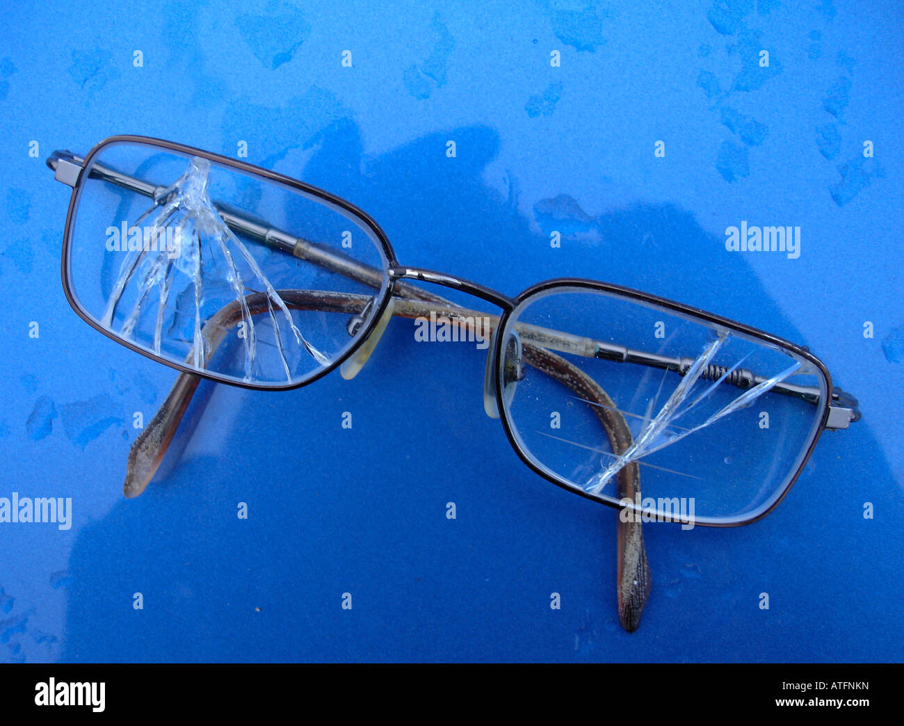 Broken spectacles Stock Photo