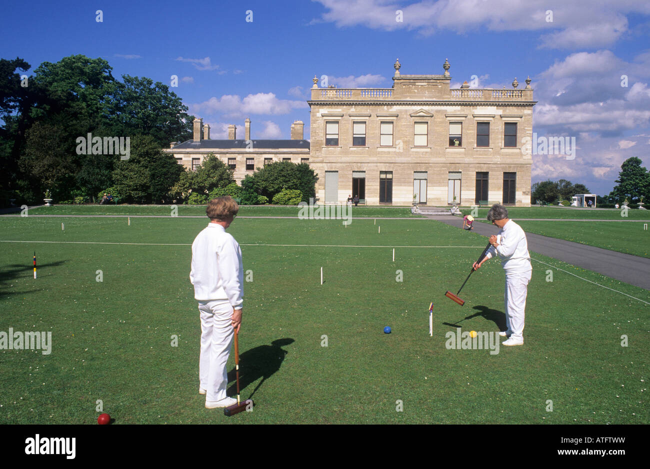 English croquet players with mallets hires stock photography and