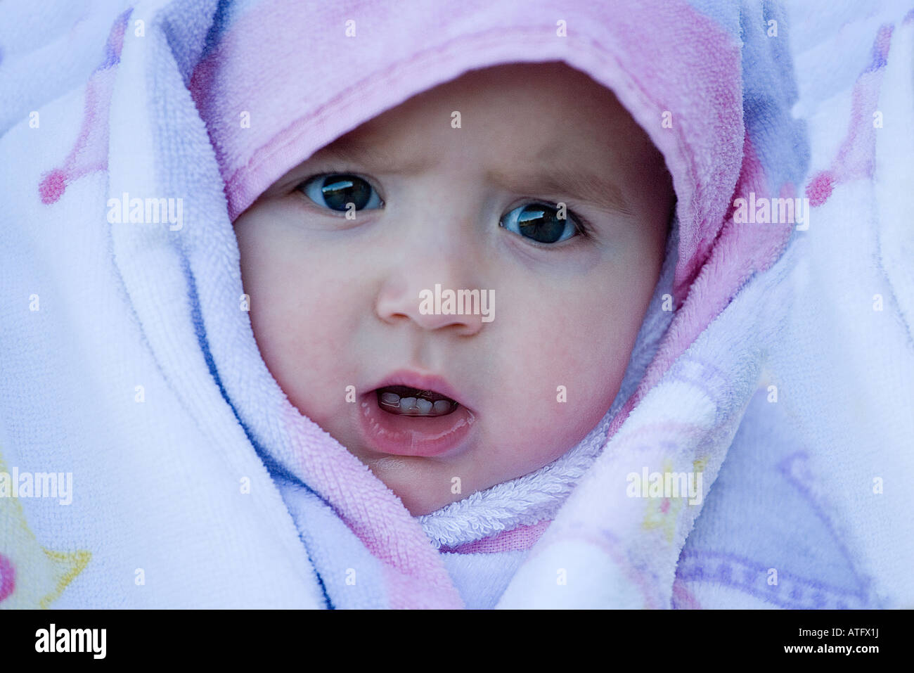 Baby girl 8 - 10 months with a blanket Stock Photo