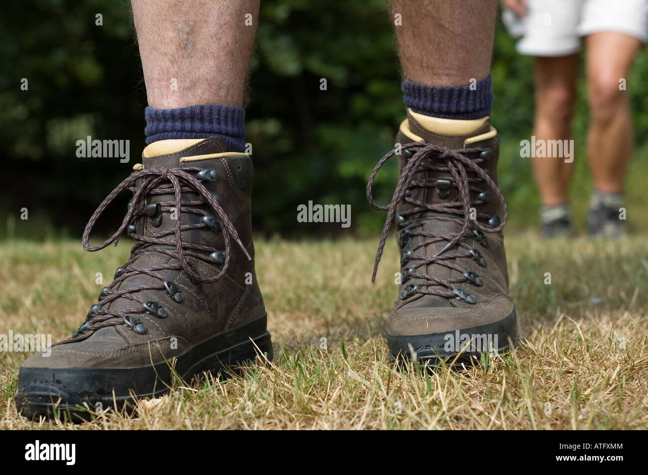 Woman following the hiker Hiking boots in front Stock Photo Alamy