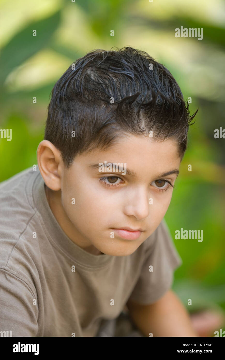 11 years old Ethnic boy looking away Stock Photo