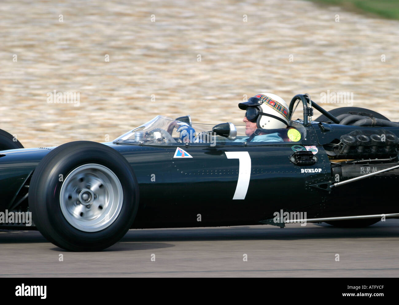 Jackie Stewart at Goodwood Revival in BRM Stock Photo