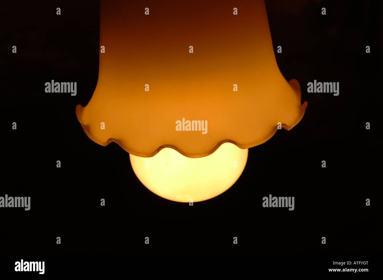 An Energy Saving Lightbulb, In A Glass Lamp Shade Stock Photo Alamy