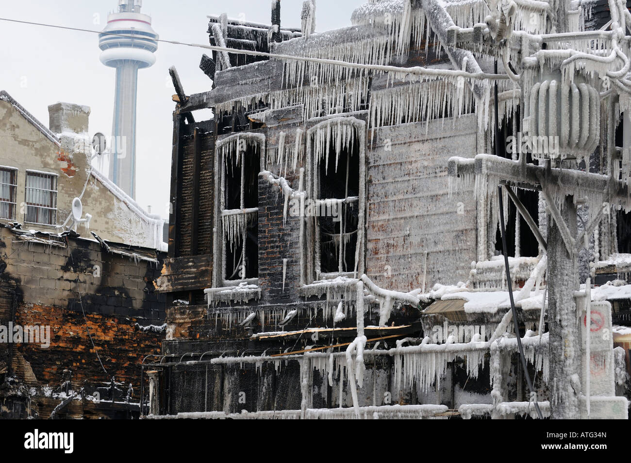 Aftermath of Queen street west fire on February 20 2008 with icicles and CN tower Stock Photo