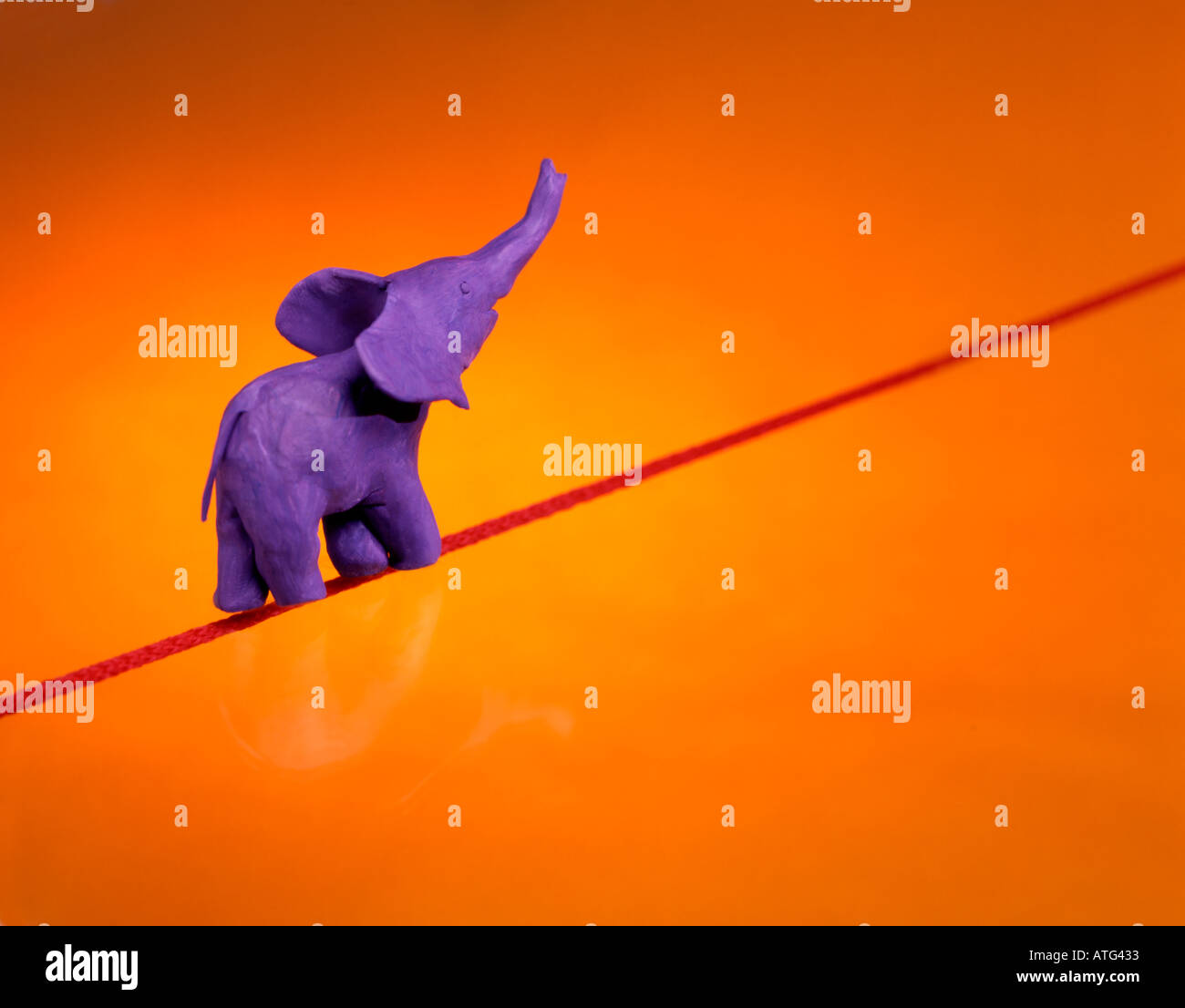 Toy elephant walking on a rope. Concept of movement, sustainable ...