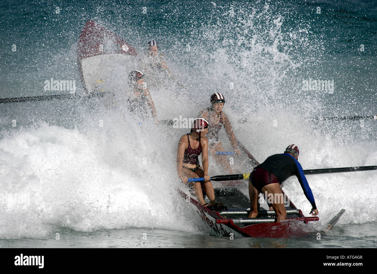 Women's surf boat event in the National Surf Lifesaving Championships at Scarborough Beach, Perth, Western Australia Stock Photo