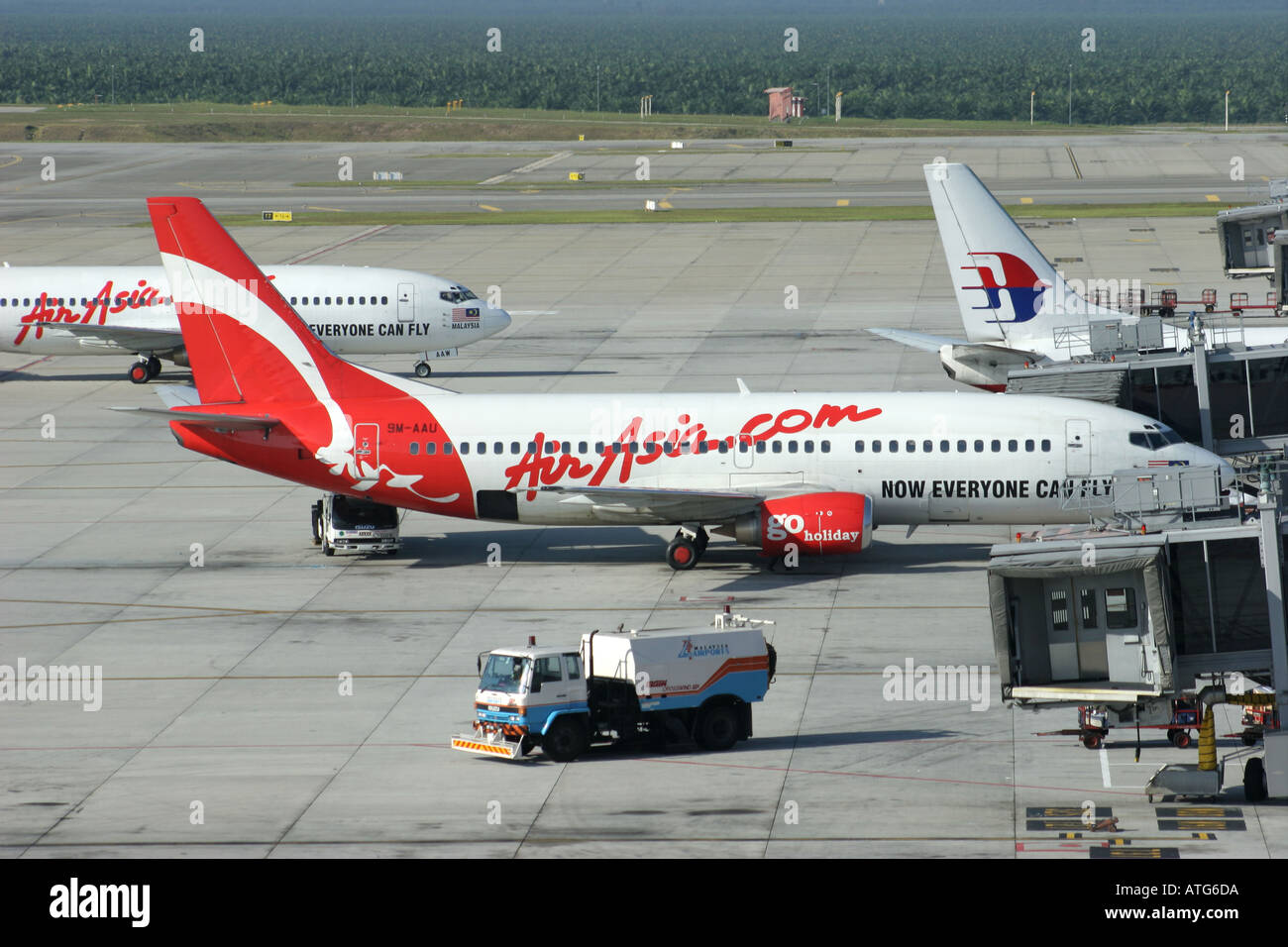 Air Asia Planes at gate in Kuala Lumpur International Airport Malaysia Stock Photo