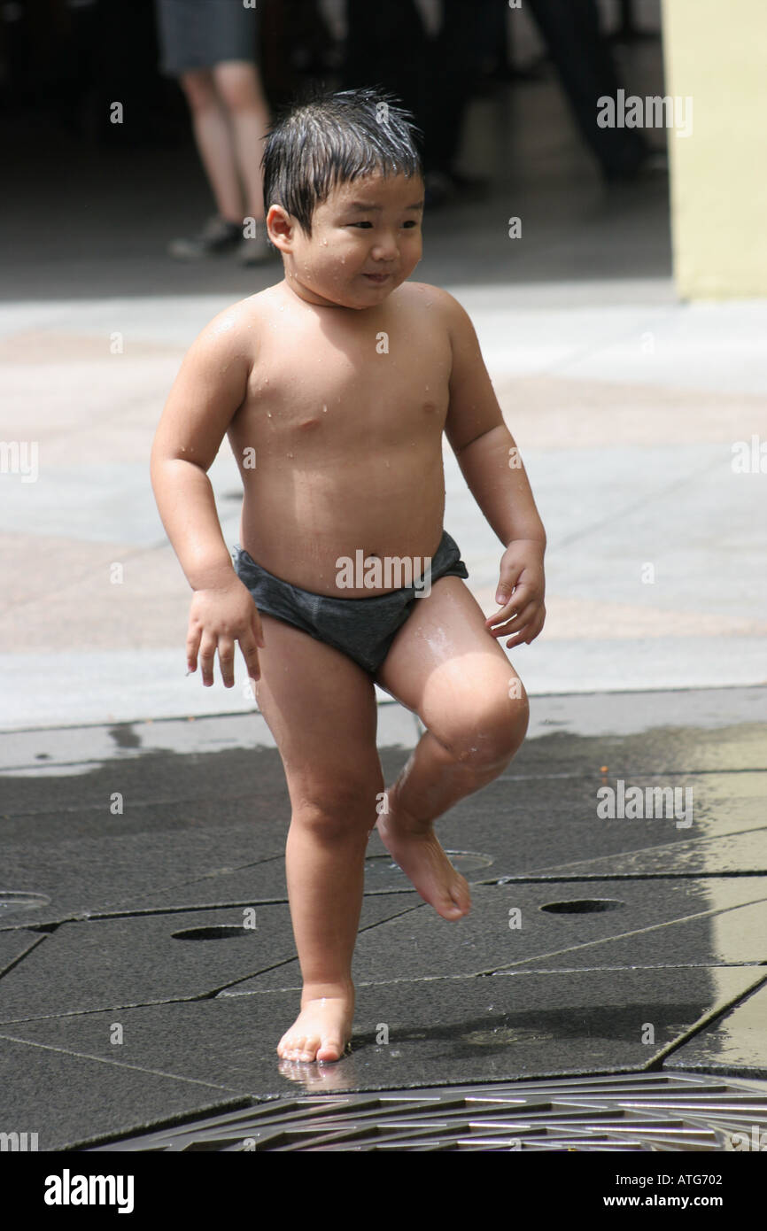 83net kids young asia naked'" Young Asian Boy Playing in Fountain Bugis Mall Singapore Stock Photo - Alamy