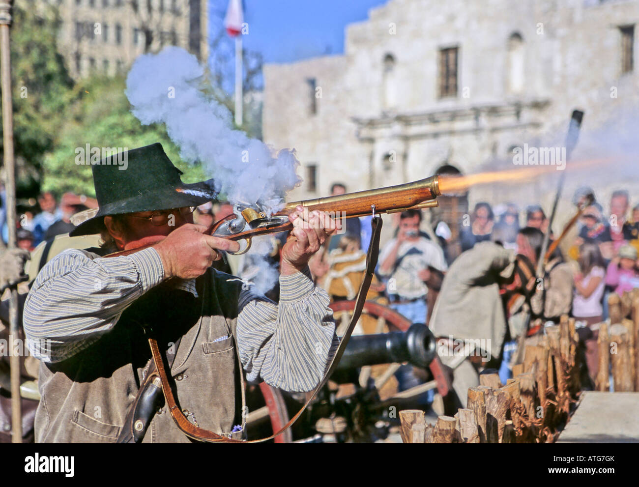Reenactor firing blunderbuss at reenactment of the Battle of the Alamo San Antonio Texas Stock Photo