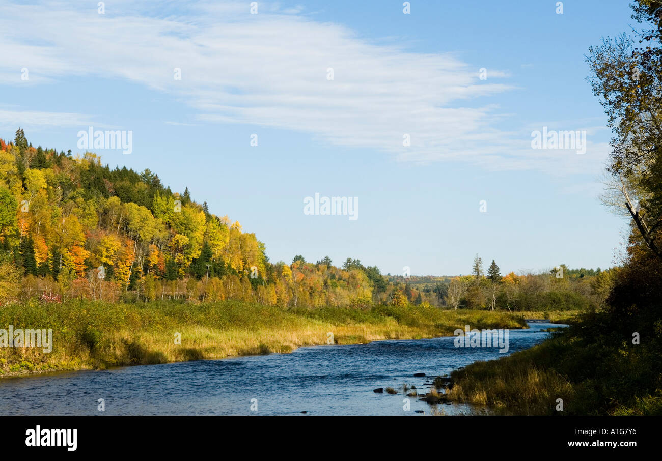 Stock image of Nashwaak River with full fall foliage surrounding in on the river banks in New Brunswick Canada Stock Photo