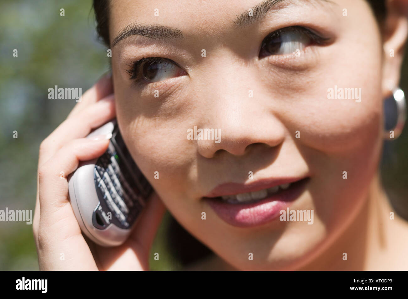 Asian Woman With a Blackberry Phone Stock Photo