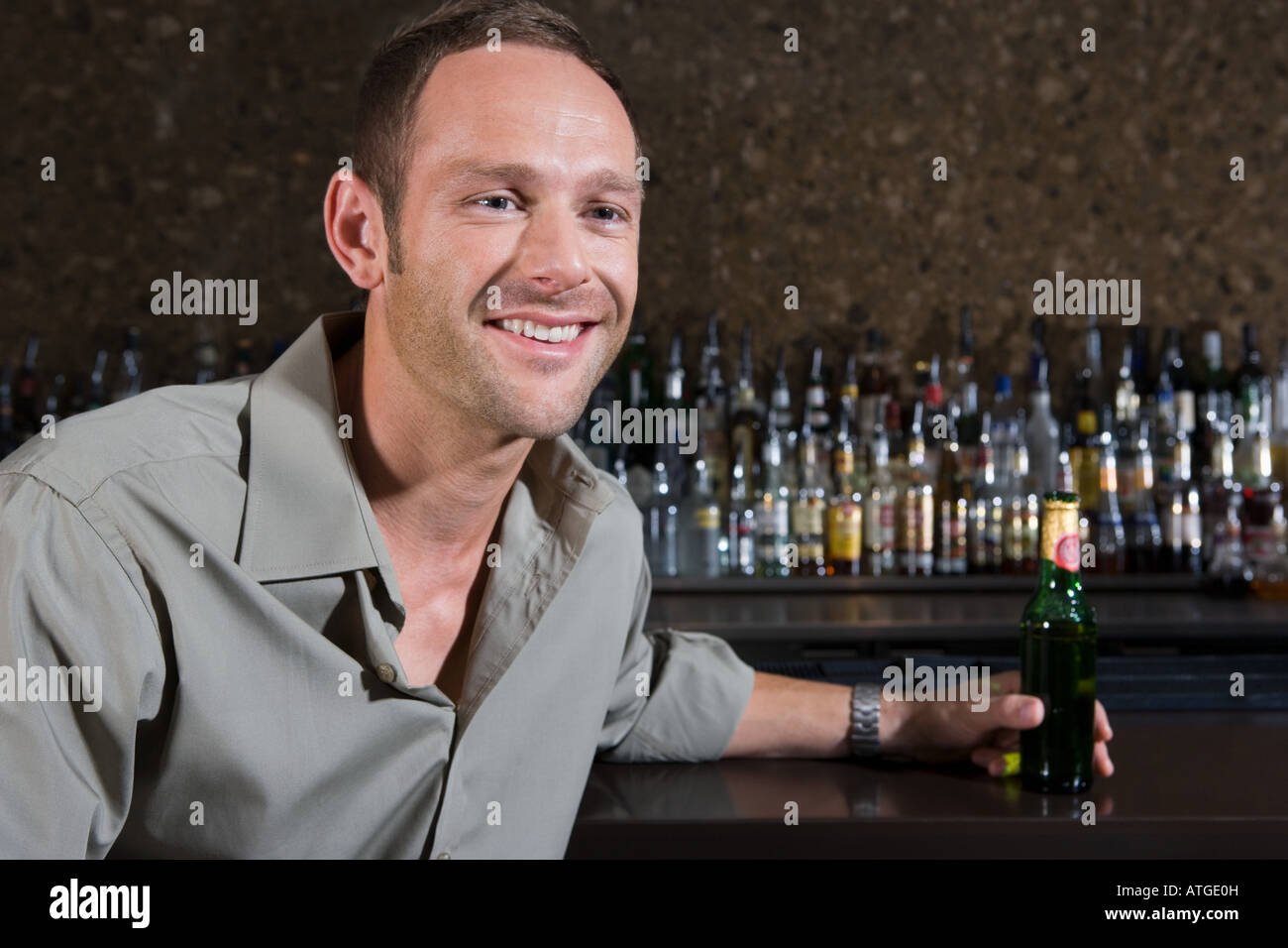 Man sitting in a bar Stock Photo