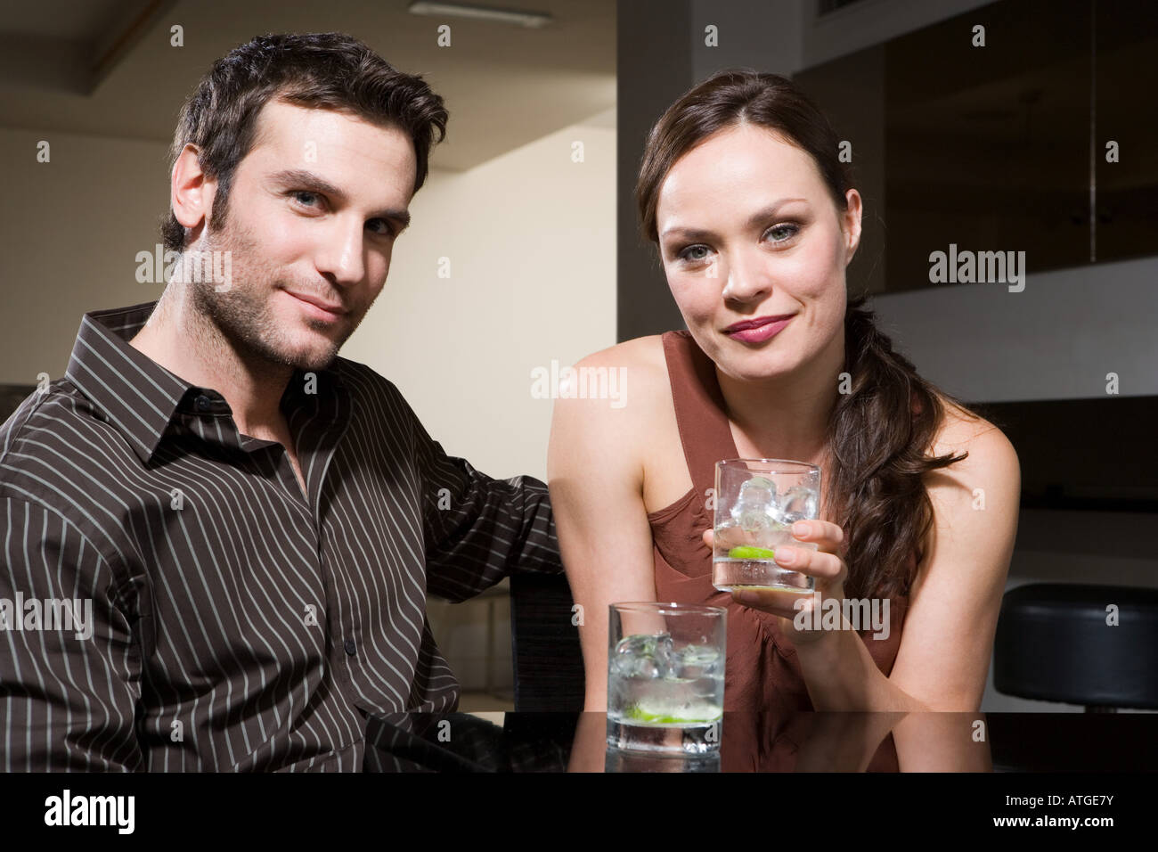 Couple drinking in a bar Stock Photo