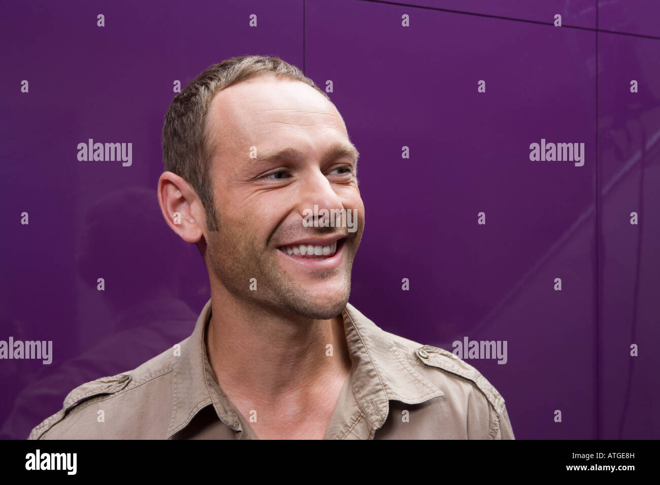 Head and shoulders of a smiling man Stock Photo