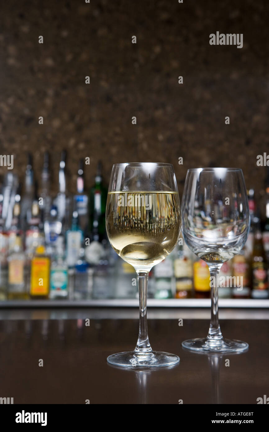 Two wine glasses in a bar Stock Photo