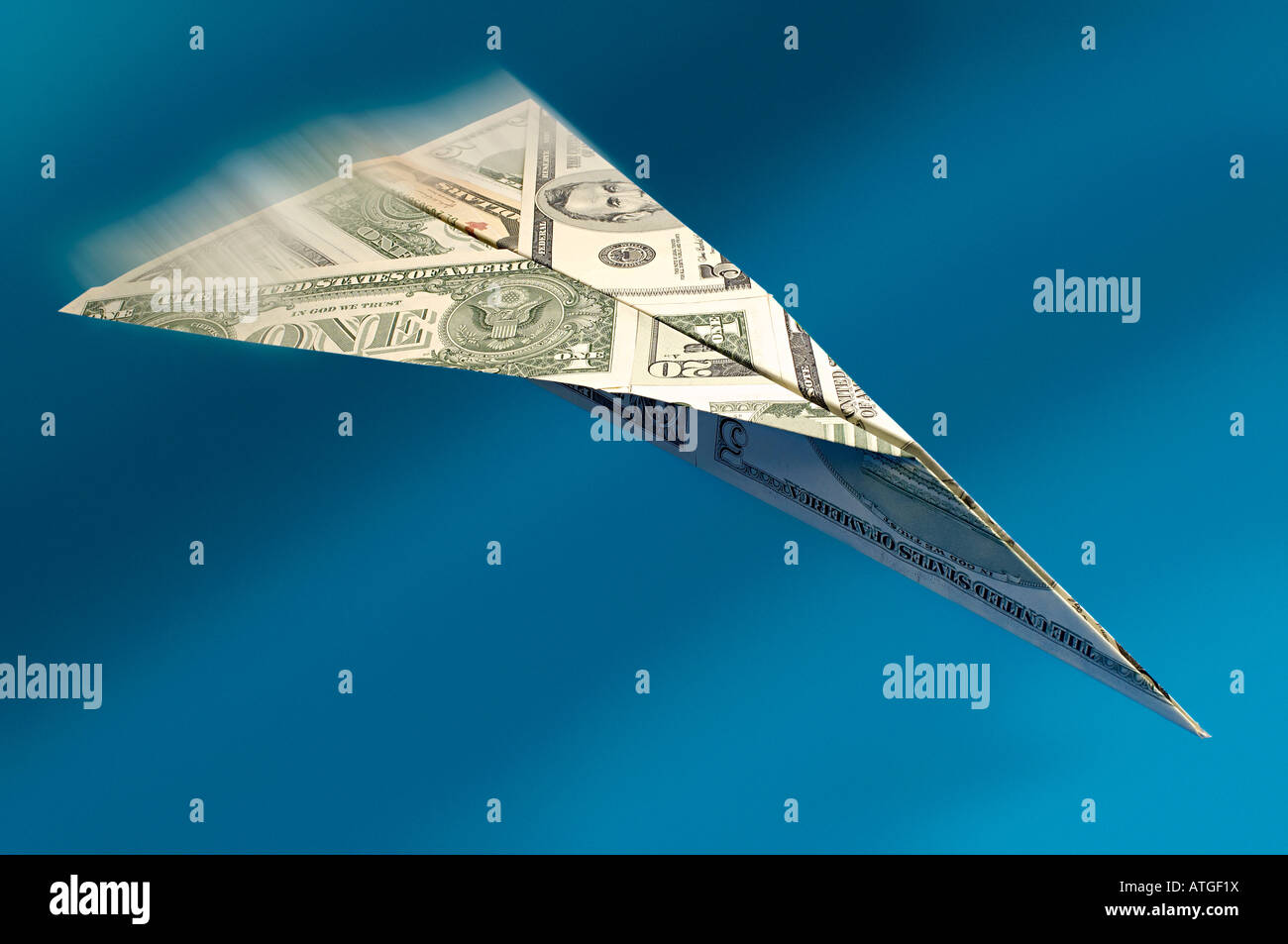 Paper Plane Coin Paper aeroplane made of dollars Stock Photo - Alamy