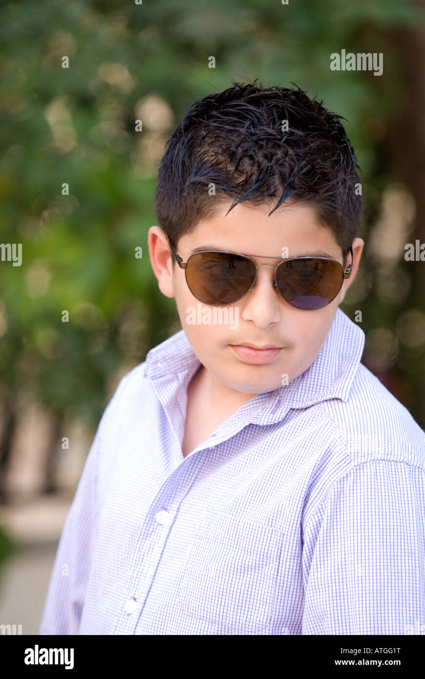 Young boy wearing sunglasses Stock Photo Alamy