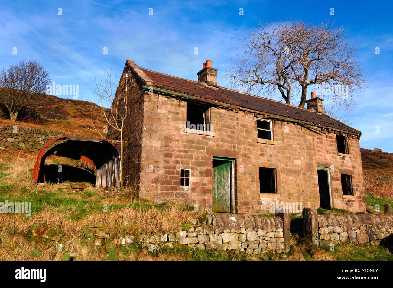 Two Derelict  Semi Detatched Stone Cottages.Located On The Staffordshire Moorlands In England. Stock Photo