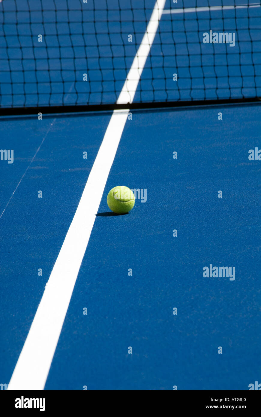 Tennis Ball on court line Stock Photo Alamy