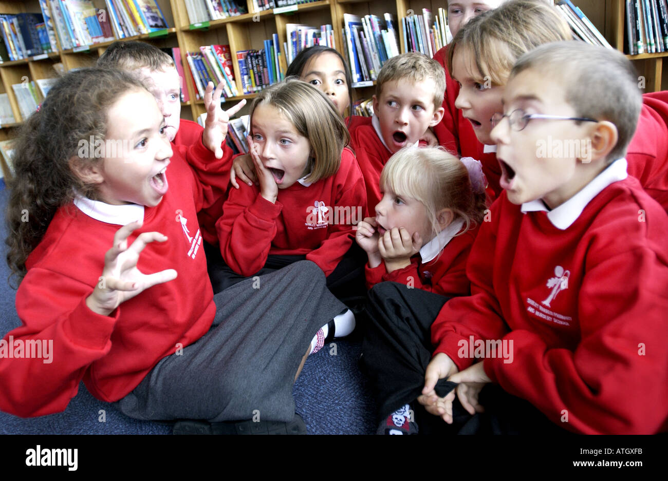 Bright alert boys and girls  in a primary school storytelling class Stock Photo