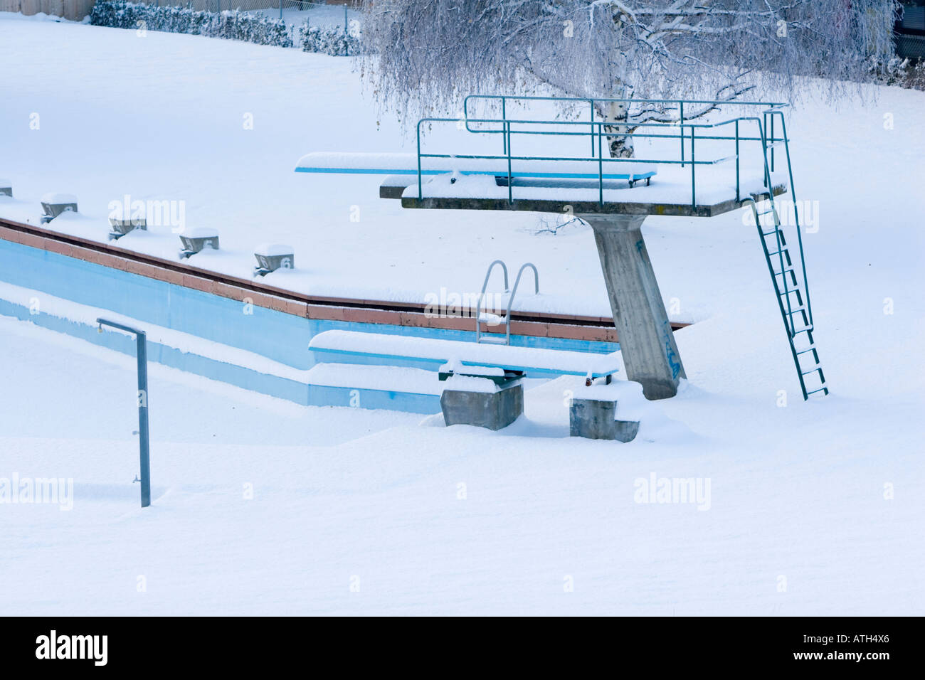 Diving platform and swimming pool covered in snow Stock Photo - Alamy