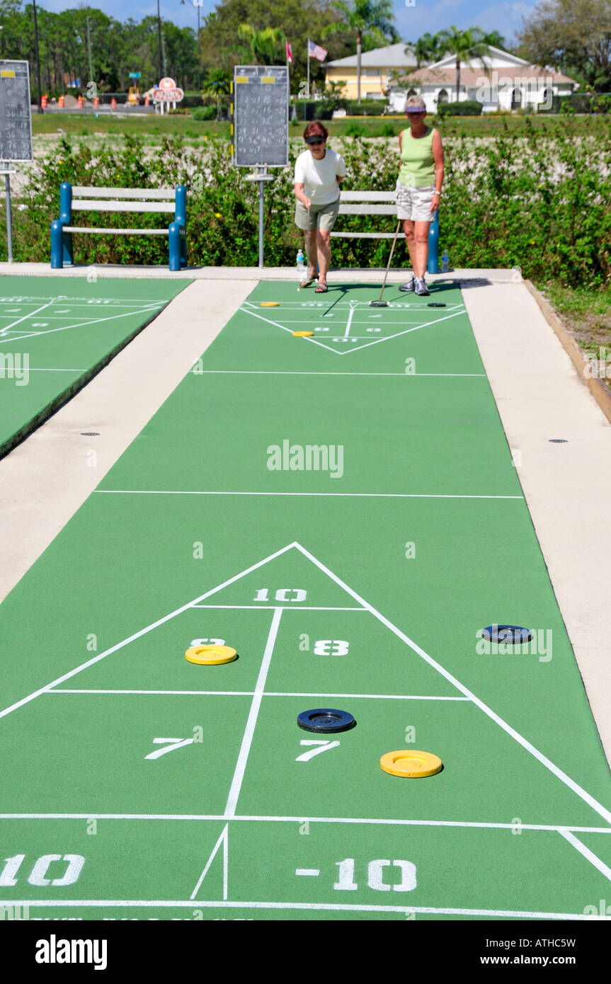 Senior women participate in shuffleboard tournament Bonita Springs Florida retirement community