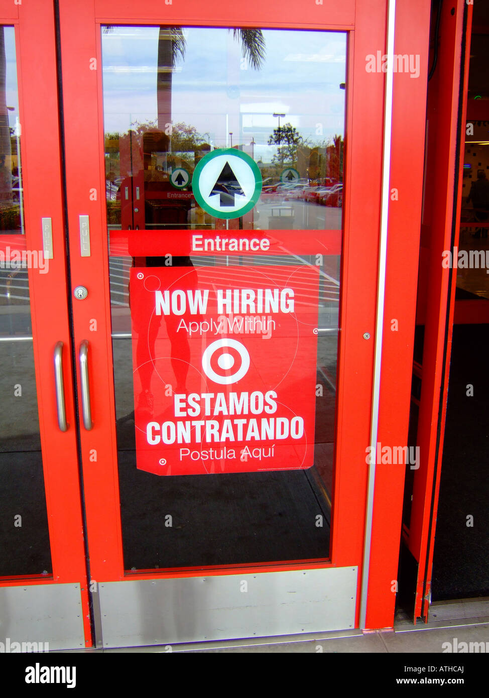 Bilingual Now Job Hiring Sign In Store Window Stock Photo Alamy