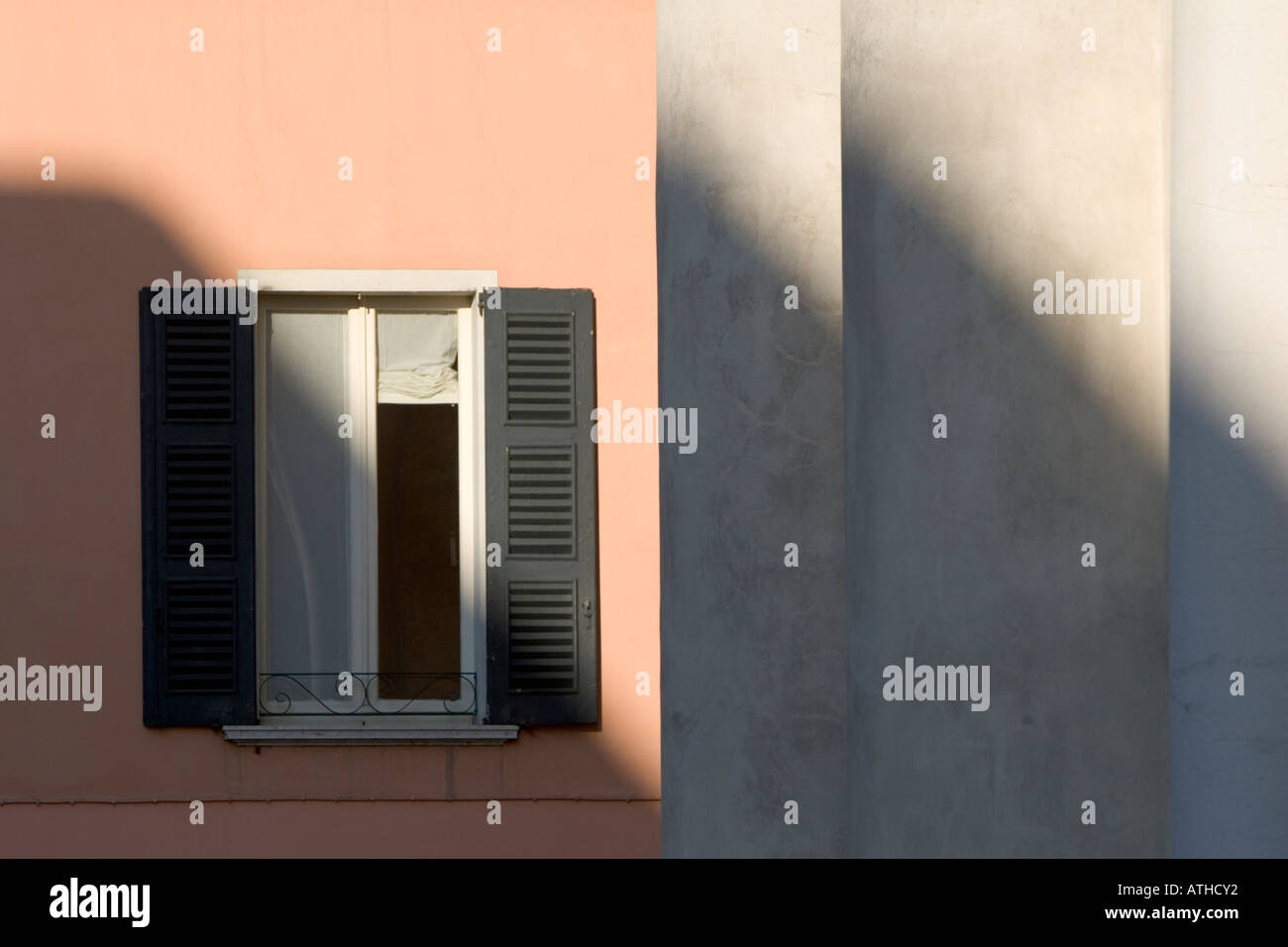 Window opens on the columns of the Church San Nazzaro e Celso, Brescia, Northern Italy Stock Photo