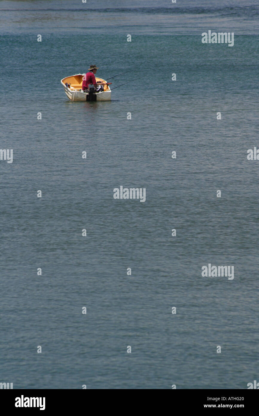 MAN FISHING IN A DINGHY MOOLOOLABA SUNSHINE COAST QUEENSLAND AUSTRALIA Stock Photo Alamy