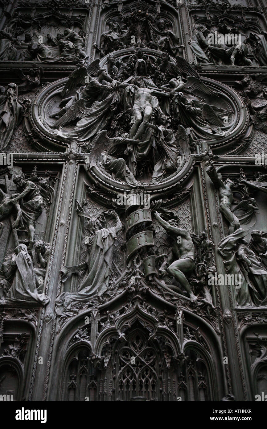 Detail on the bronze main door of the Duomo cathedral Milan Italy Stock