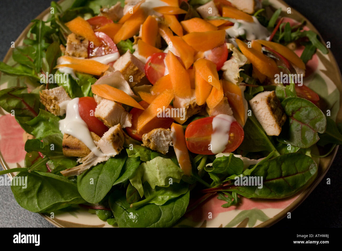 Home made Chefs salad  baby plum tomato chicken baby leaf salad carrot buttermilk dressing healthy sslimming 5 a day five a  day Stock Photo