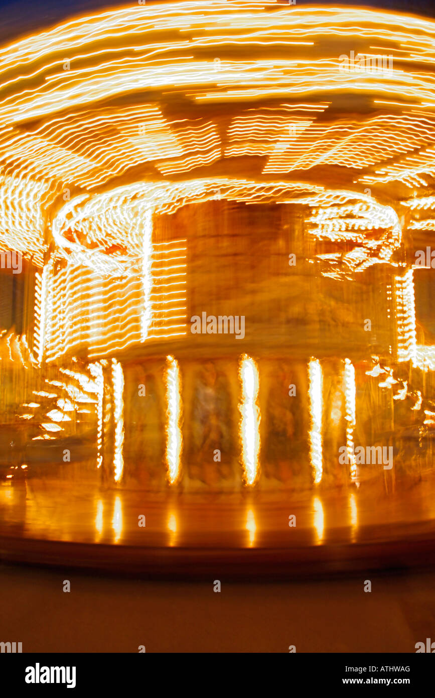 trails of light of a carousel rotating Stock Photo
